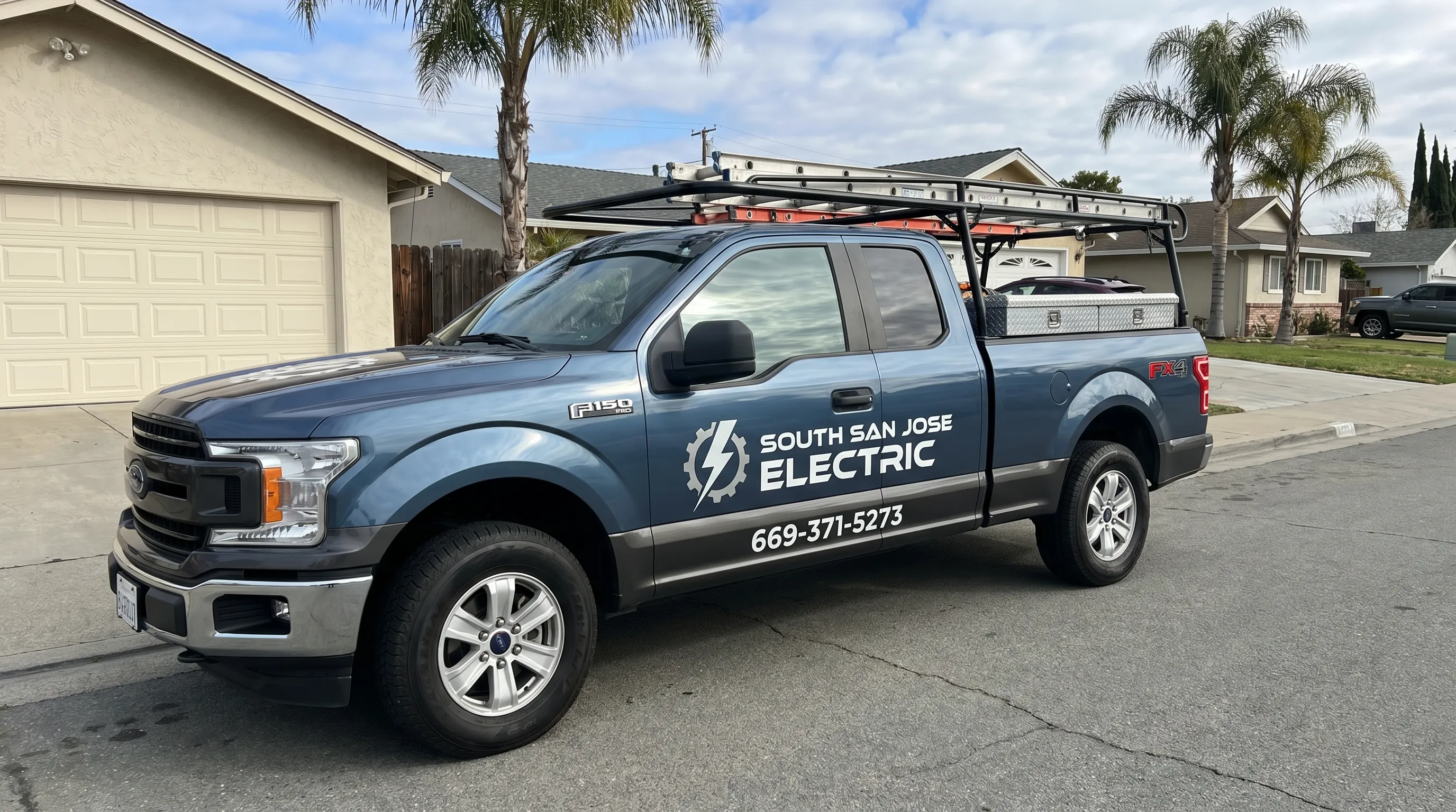 Electrician working on a residential electrical panel in San Jose, CA